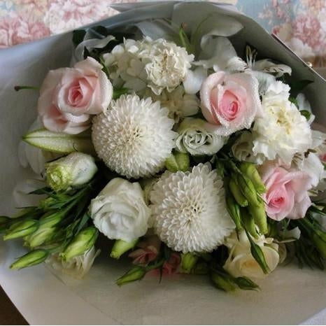 Pearl Lustre Bouquet. A selection of fresh white and pale pink flowers styled together in an elegant bouquet.