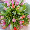 Tribute to the famous Tulip made popular in Holland ("flower shop of the world"). Curvaceous and colourful delivered in a hatbox, bedded in soft tissue and finished with an orange ribbon & bow. 